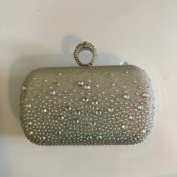 Charming Charlie Handbags - Charming Charlie RSVP Silver Ring Clutch